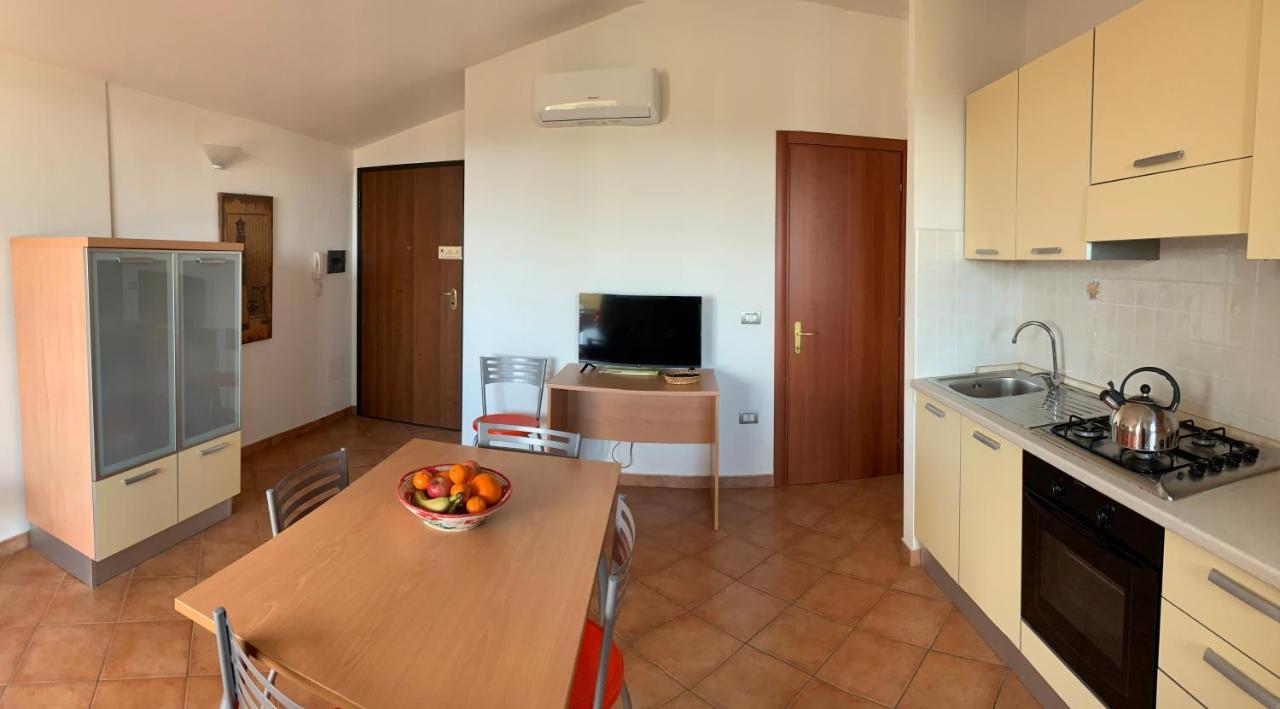 Delfino Apartment Кала Гононе Екстериор снимка