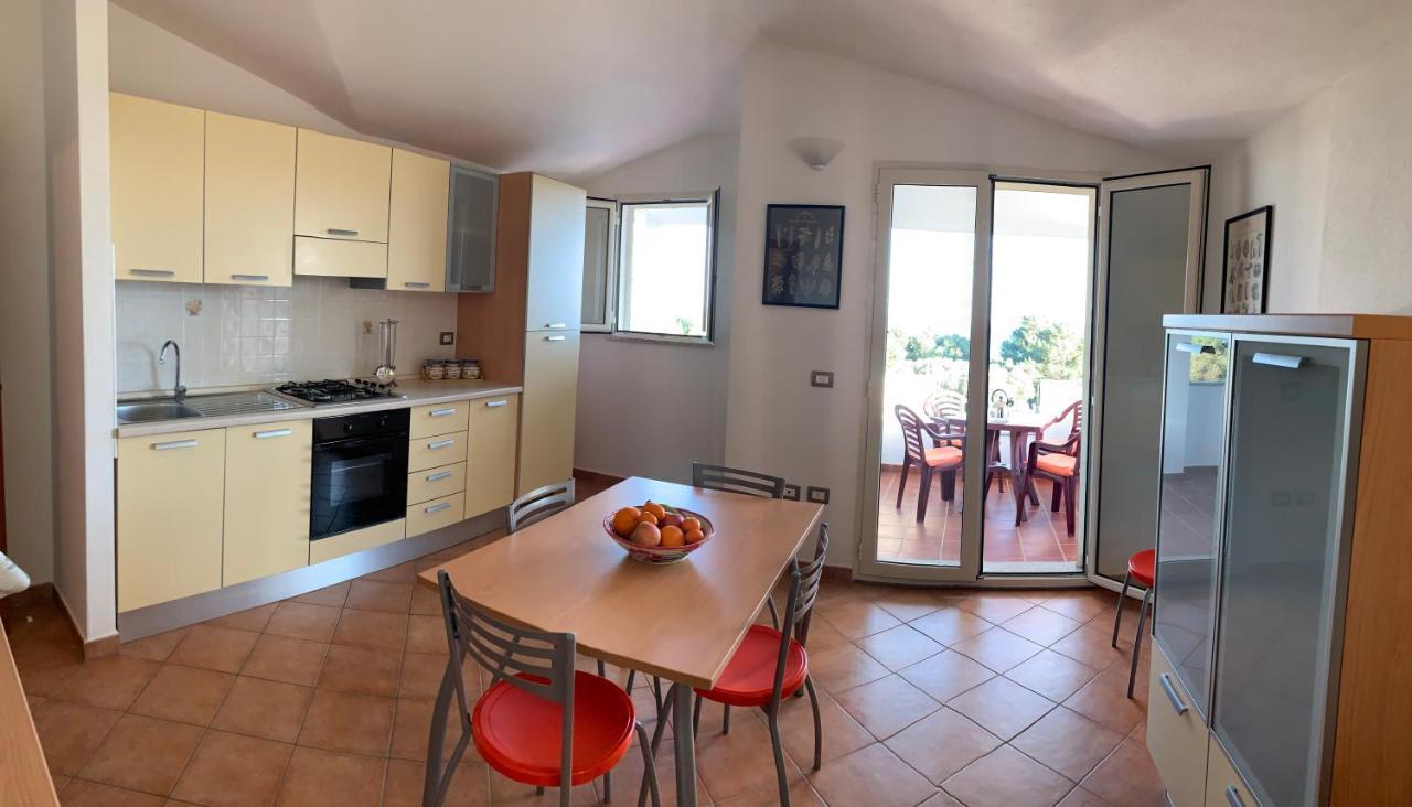 Delfino Apartment Кала Гононе Екстериор снимка