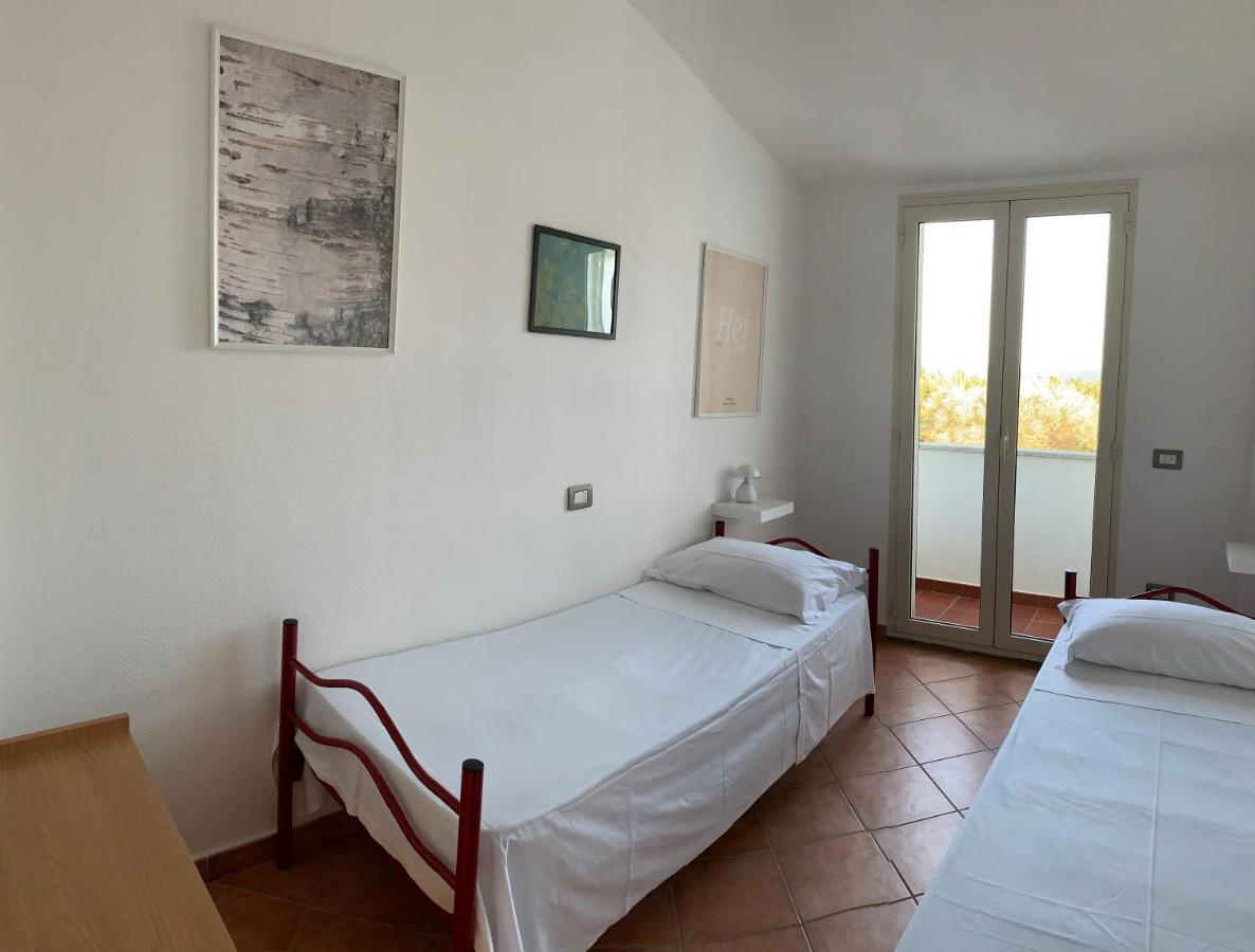 Delfino Apartment Кала Гононе Екстериор снимка